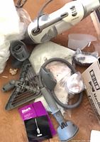 Main handheld steam cleaner body with hose, mop head and pads