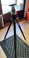 Full view of Star D tripod standing with legs extended