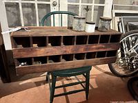 Front view showing 20 cubbies and distressed wood finish