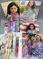 All 20 magazines and catalogues arranged to show variety of covers