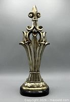 Full front view of finial showing overall design and height proportion