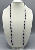 Full length view of necklace on display bust