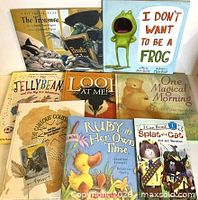 All eight books front covers visible
