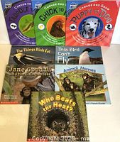 Front view showing all eight books laid out