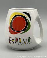 Front view showing Sol de Miró design and España text