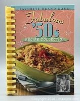 Front cover showing title, series and comb binding