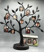 Tree stand with frames and original packaging