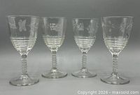 Front view of all four ribbed etched glasses