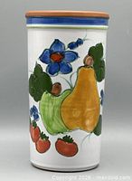 Front view showing handpainted fruit and floral design