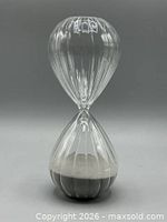 Hourglass upright showing full form and ribbed glass construction