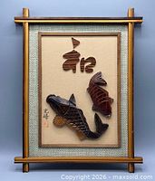 Front view showing full framed wood relief art
