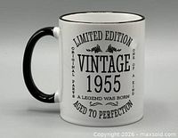 Mug side view showing handle and printed design