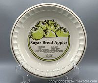 Front view showing apple graphic, recipe text, fluted edge