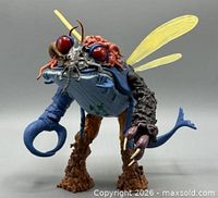 Front view of Mega Mutant figure standing upright