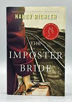 Front cover of paperback novel showing title, author, artwork and Giller Prize sticker