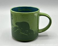 Front profile showing beaver silhouette and Tim Hortons interior logo