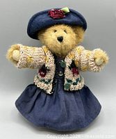 Front view of Boyds bear showing clothing, jointed limbs and tag