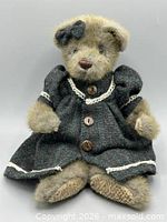 Front view of teddy bear showing full outfit and overall condition