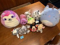 All ten plush toys arranged on table