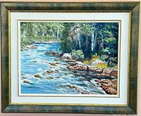 Frontal view of framed river landscape painting