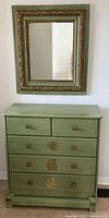 Dresser and mirror together showing overall style and color