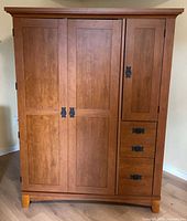 Front view closed showing doors, drawers, hardware