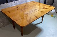 Top view of solid pine dining table fully extended