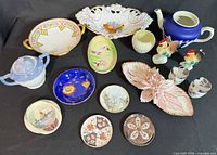 Full lot overview showing all porcelain and ceramic pieces