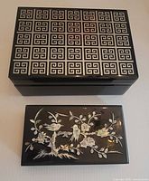 Top view showing both boxes closed, illustrating exterior designs and relative sizes