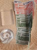 Coupons, apple paperweight, rectangular glass block