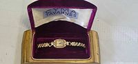 Watch in open Cyma Tavannes presentation box