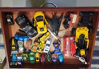 Top view of drawer showing majority of diecast vehicles