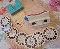 Both viewers with nine reels and film-strip cards displayed