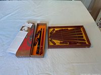 Both boxed chopstick sets opened to display contents