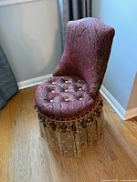 Front view of upholstered vanity chair