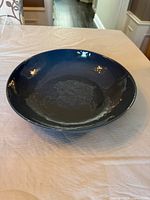 Top view of blue serving bowl showing interior glaze and color