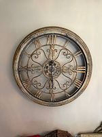 Front view of round decorative wall clock