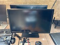 Front view of Dell U2713Hb monitor powered off, stand visible