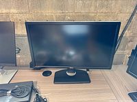 Front view of monitor on stand, screen off