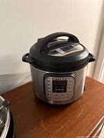 Front angled view of Instant Pot showing full unit with lid