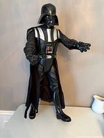 Front angled view of full 31-inch Darth Vader figure standing on tabletop