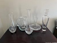 All five glass pieces grouped on table