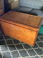 Closed wooden chest showing front and top