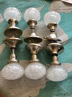 Three pairs of bubble glass knobs with satin nickel hardware