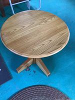 top view of round hardwood table