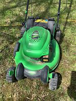 Top view of complete Lawn-Boy mower showing deck, wheels, handle