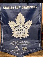 Full view of banner with Stanley Cup Champions heading and full list of championship years