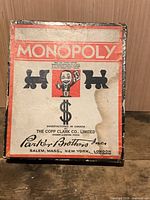 Front of Monopoly supplement box showing branding and manufacturer information
