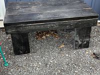 full view of bench front showing top surface and legs