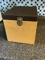 Closed box showing exterior material and latch